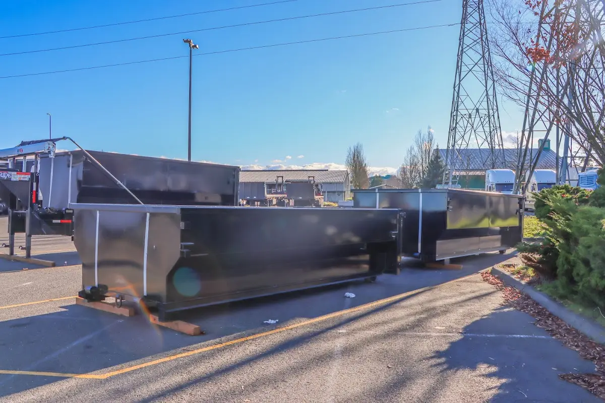 Roll-off dumpster ready for waste disposal at job site for Construction Dumpster Rental in Green Bay